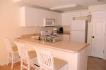 Fully Equipped Kitchen with Snack Bar for your convenience.